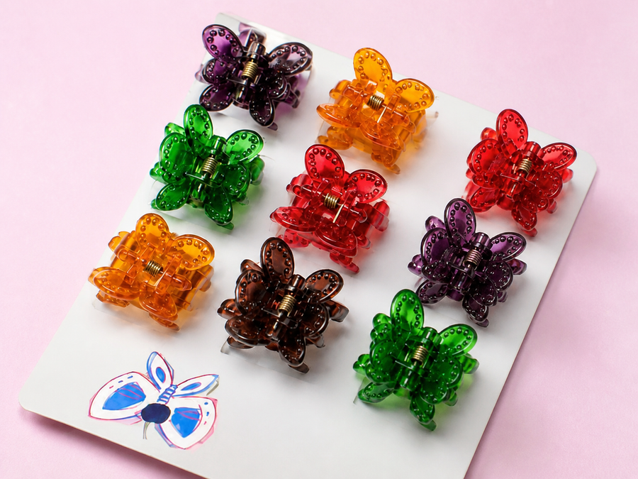 Assorted butterfly hair claw clips on a display card