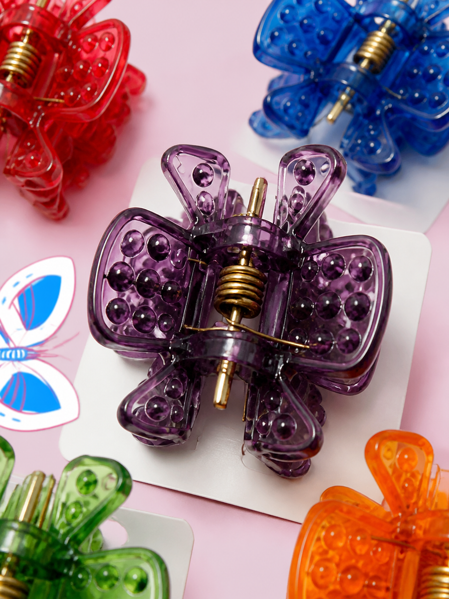 Assorted butterfly hair claw clips in a display set