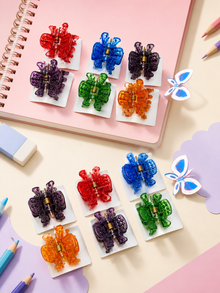 Assorted butterfly hair claw clips in a display set
