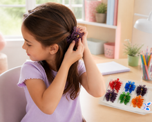 Assorted butterfly hair claw clips in a display set