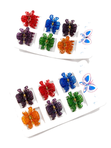 Assorted butterfly hair claw clips in a display set