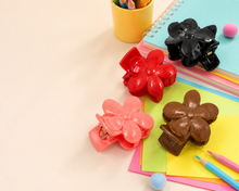 Flower hair claw clips in black red peach and brown shades