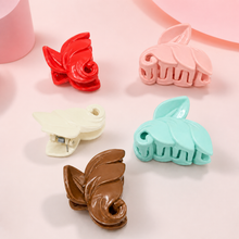 Leaf-shaped hair claw clips in rose tones