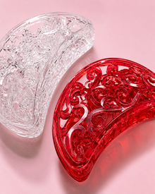 Curved barrette hair clips in red and clear finishes
