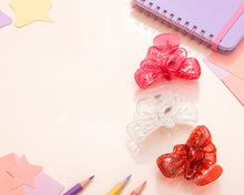 Translucent bow and butterfly hair claw clips